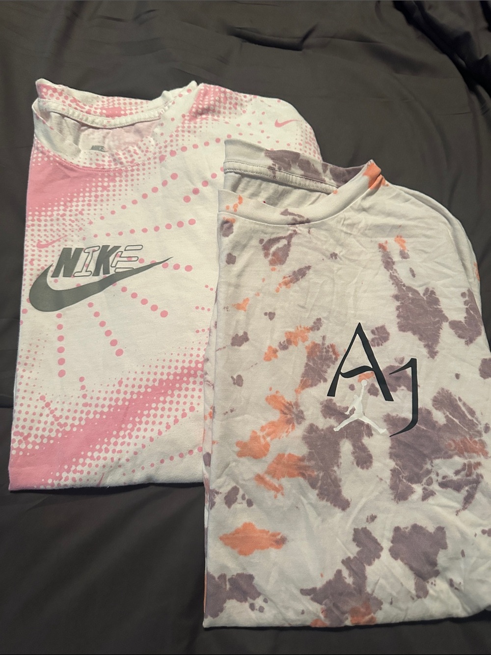 Nike Tee with Pink Dot Graphic and Air Jordan Tee with graphics. Both XXL